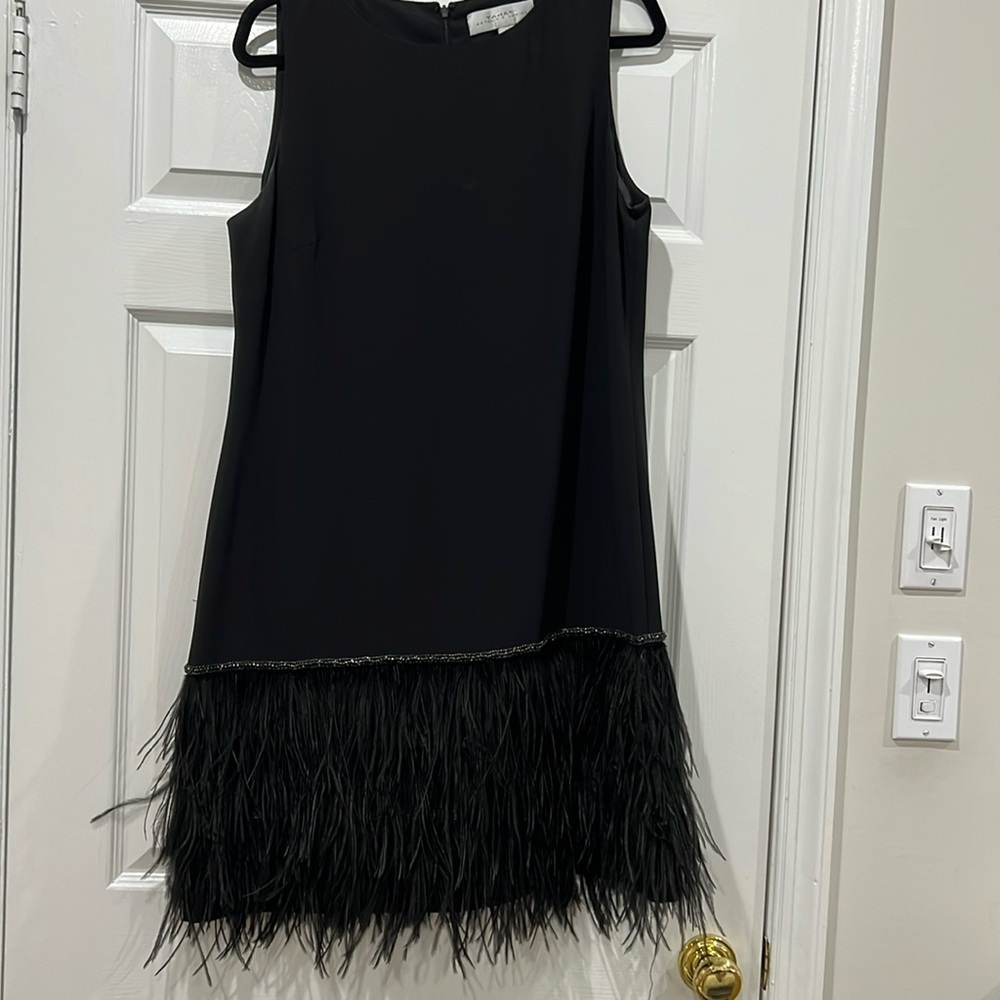 Tahari ASL sleeveless black dress with bead and feather detailing on the bottom